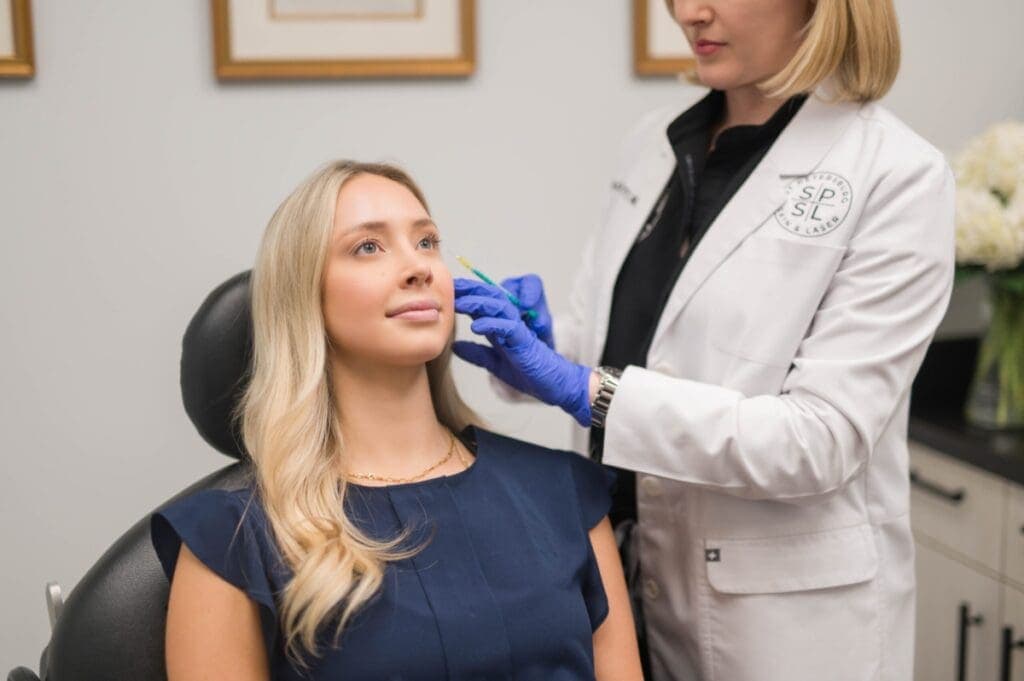Dr. Kesty performing advanced eye rejuvenation treatment