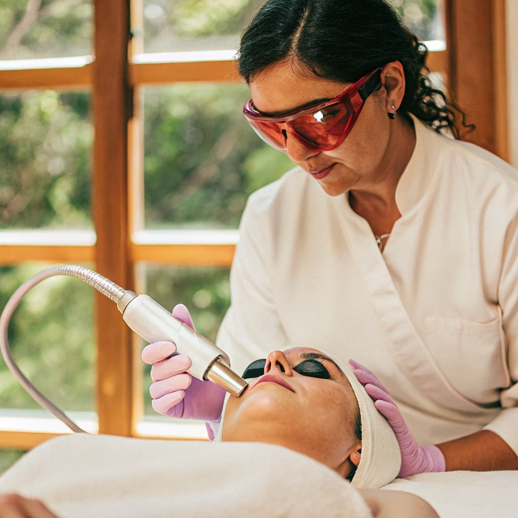 Dr. Kesty performing CO2 Laser treatment